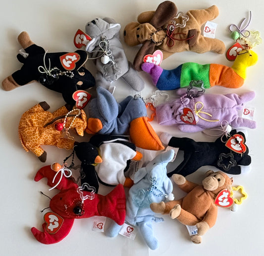 Authentic TY Beanie Babies Charms with tags attached.